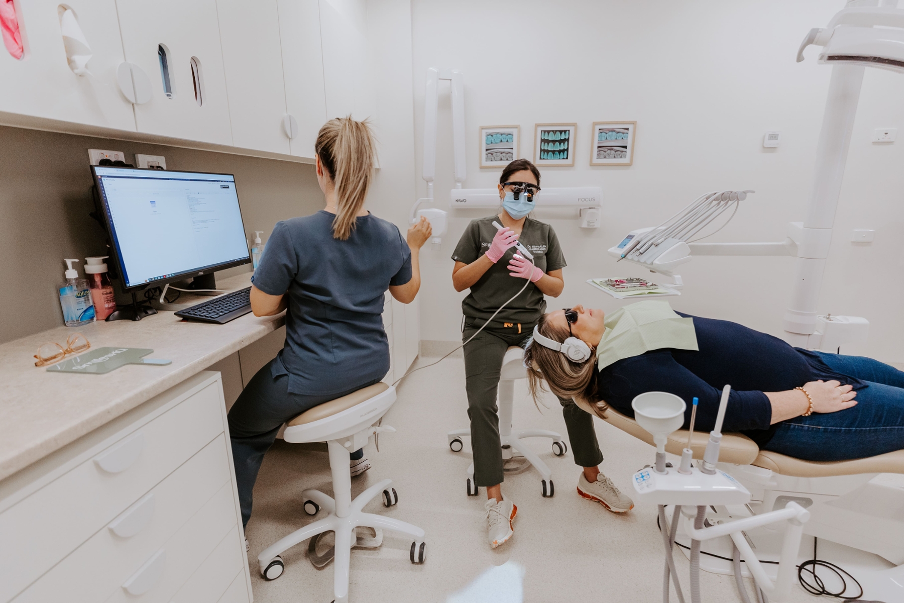 woman holding jaw from dental emergency