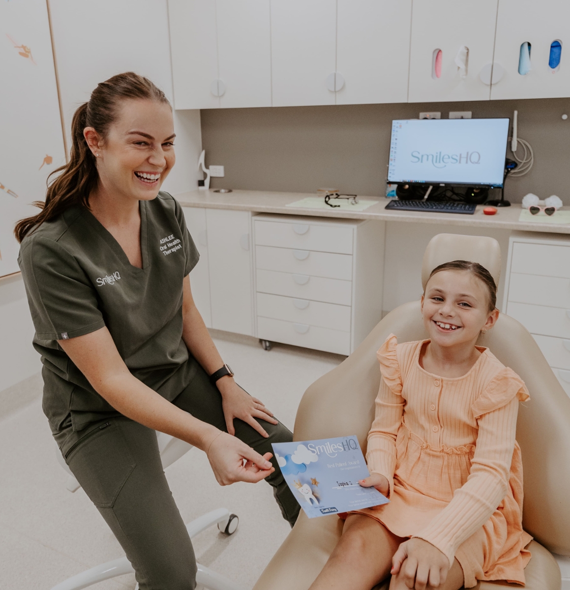 young patient smiling after getting dental care at SmilesHQ