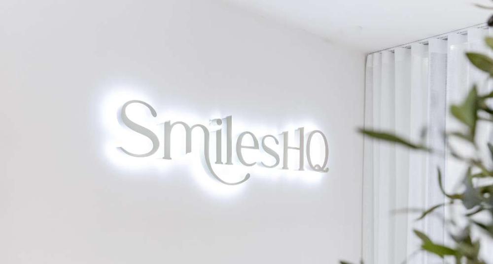 smilesHQ sign for dentists in warners bay