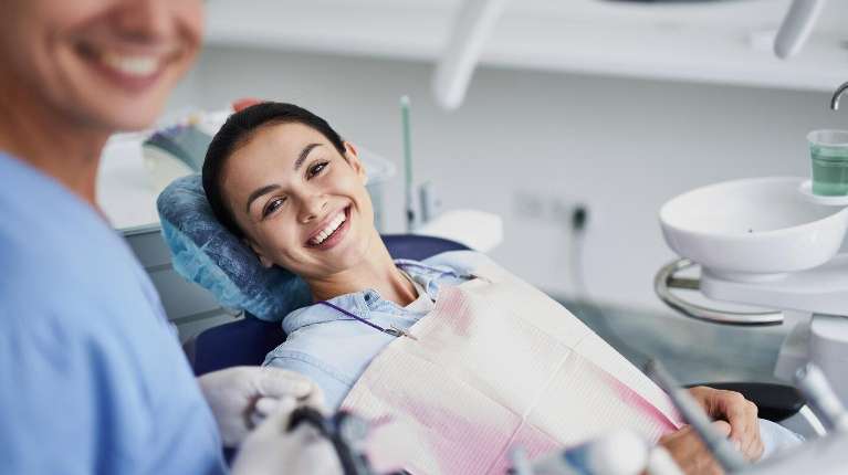 woman smiling in dental chair 
