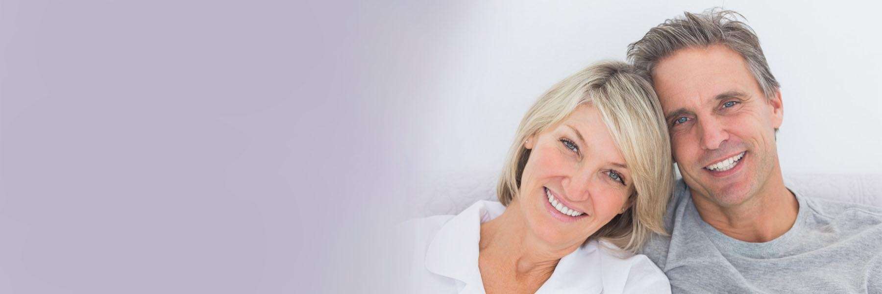 Couple with veneers smiling in warners bay