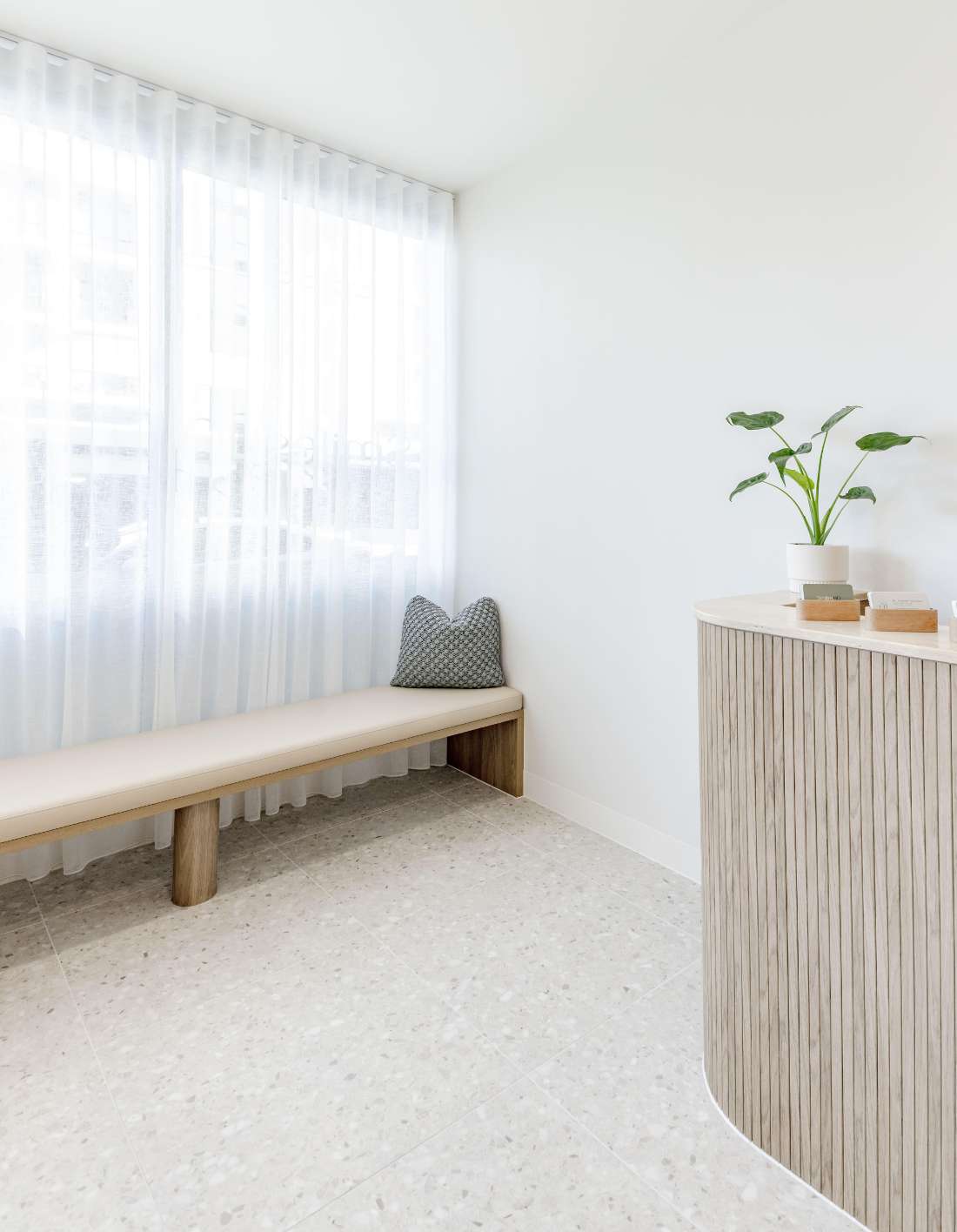 bench and reception desk in SmilesHQ